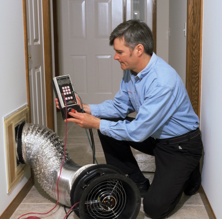 man fixing thing